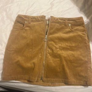 cute little tan skirt. It’s a Love tree brand.